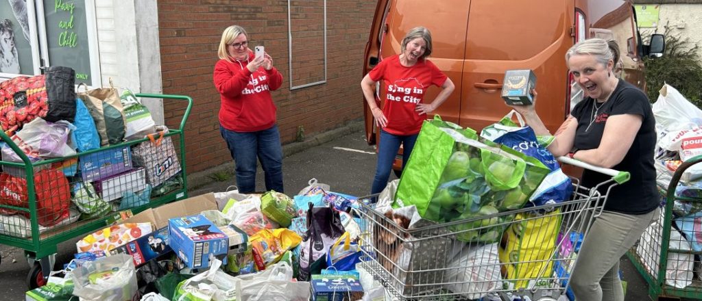 The Sing in the City and Chief Radio team with their huge haul of pet food